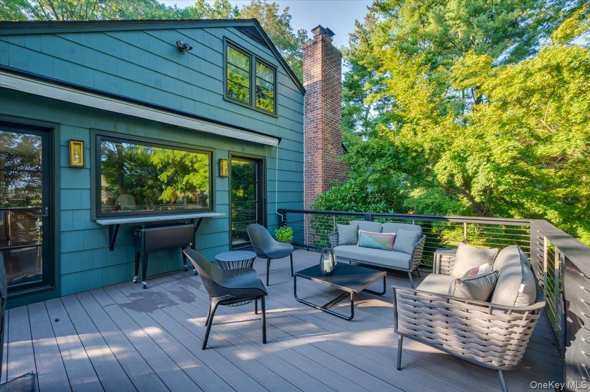 18 South Ridge Road Larchmont, NY 10538 - Photo 27 of 35 a outdoor living space with furniture and garden view