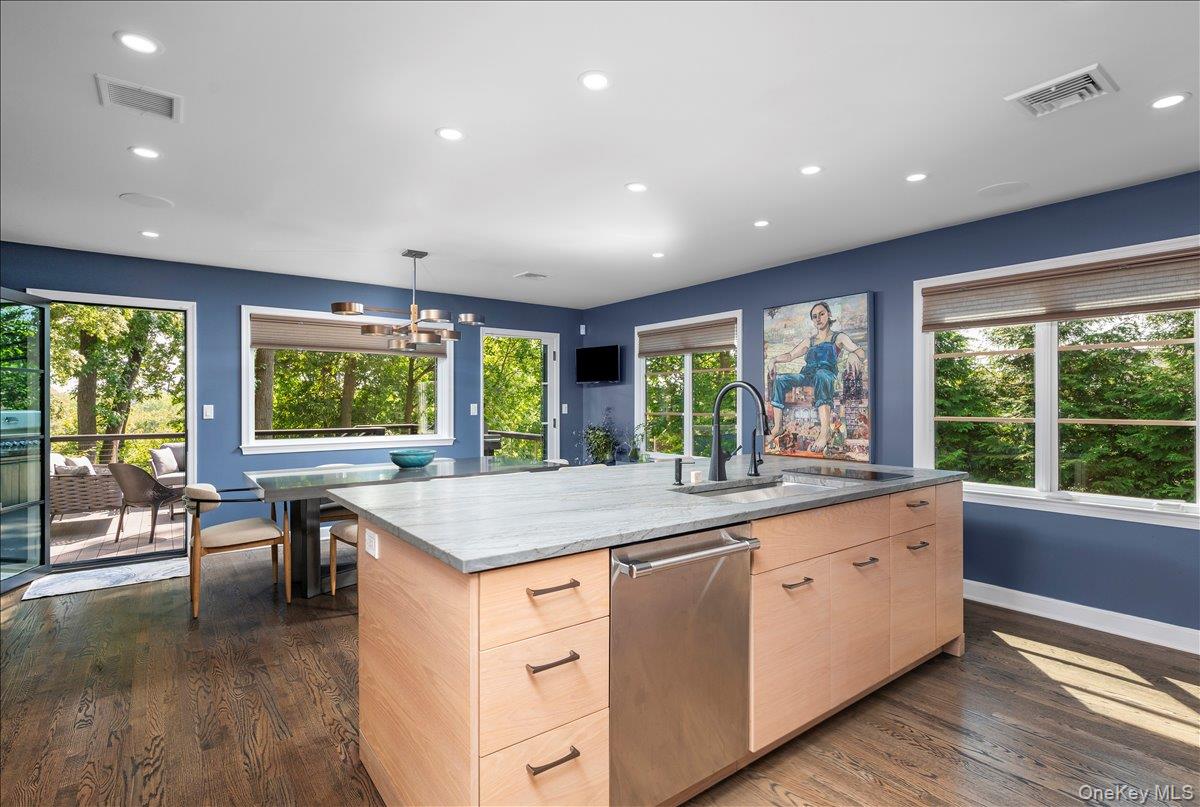 18 South Ridge Road Larchmont, NY 10538 - Photo 7 of 35 a kitchen with a stove sink and cabinets