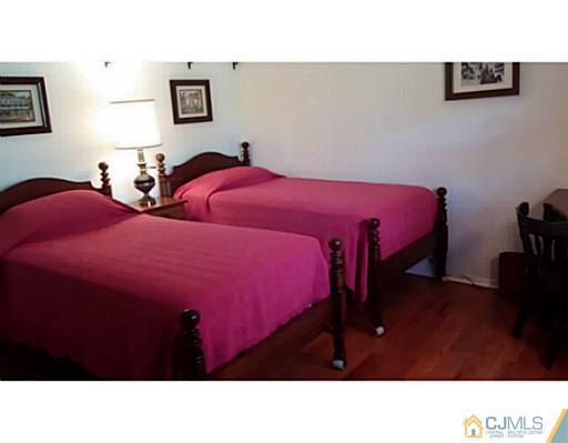 3 Warwick Road Edison, NJ 08820 - Photo 14 of 23 a bedroom with two beds and a desk