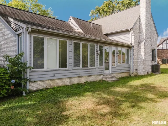 a house view with a garden space
