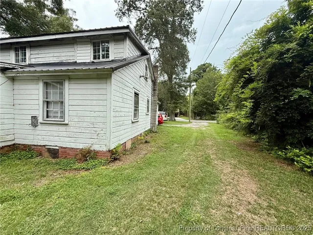 a view of a backyard with a garden