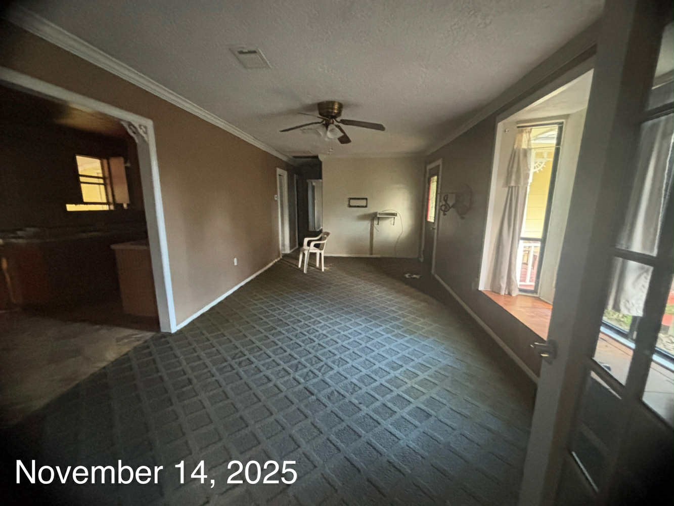 240 Boat Launch Road Point Blank, TX 77364 - Photo 2 of 12 a view of a livingroom with a ceiling fan and window