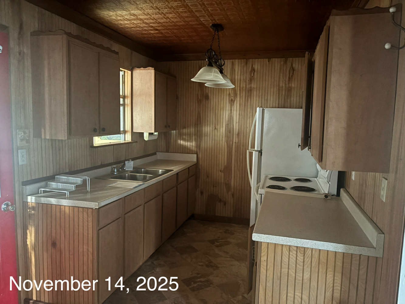 240 Boat Launch Road Point Blank, TX 77364 - Photo 8 of 12 a kitchen with stainless steel appliances granite countertop a sink stove and refrigerator