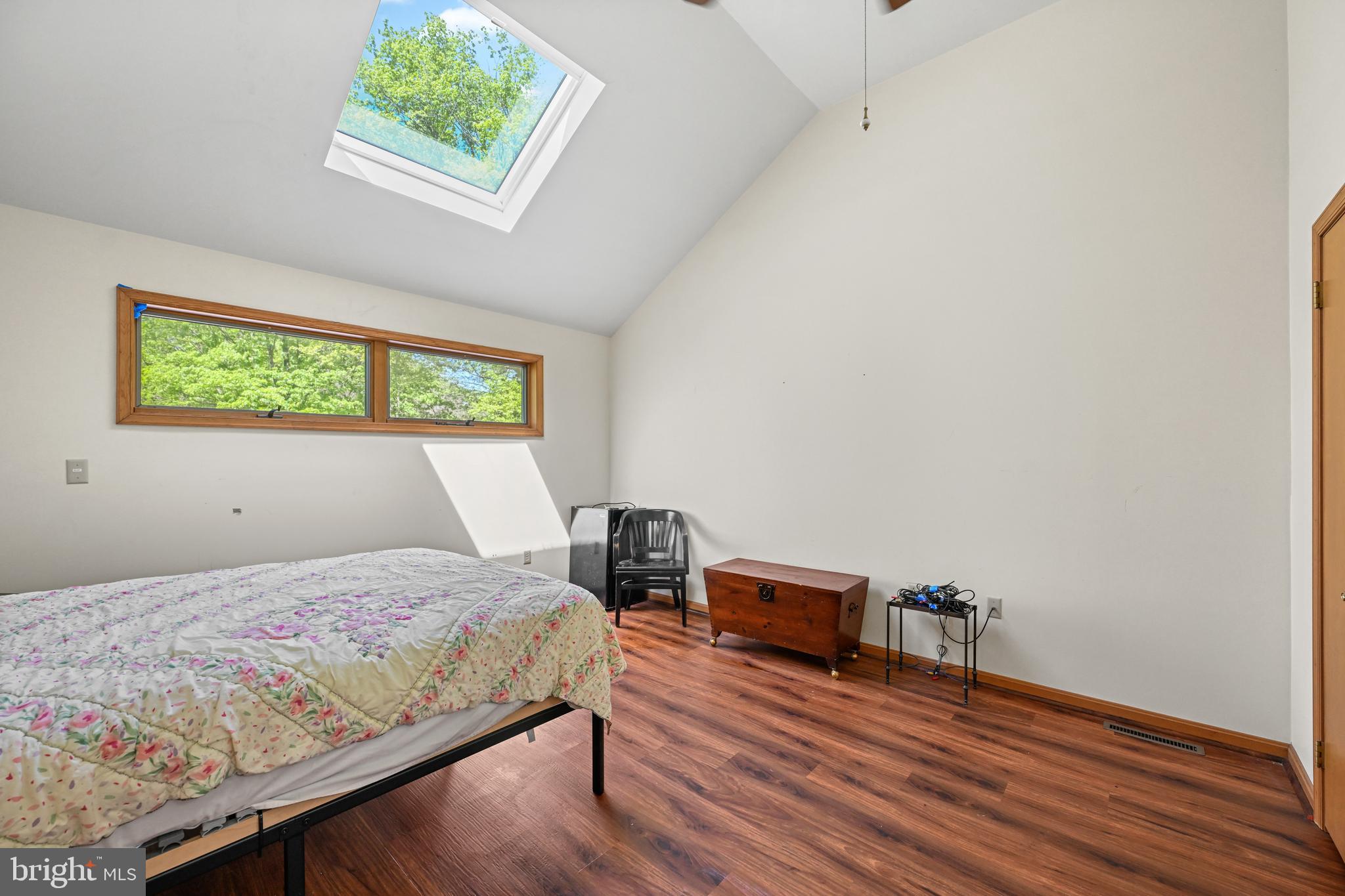 1680 East Street Road Kennett Square, PA 19348 - Photo 16 of 30 a bedroom with a bed bookshelf and a window
