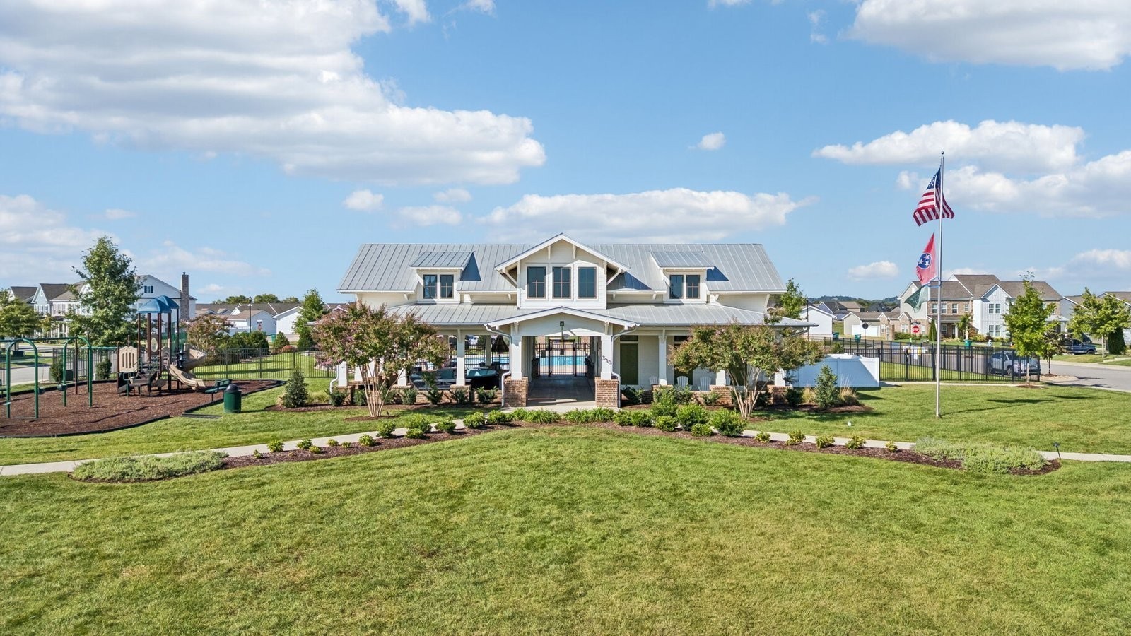 299 Harvest Point Boulevard Spring Hill, TN 37174 - Photo 39 of 48 a front view of a house with garden