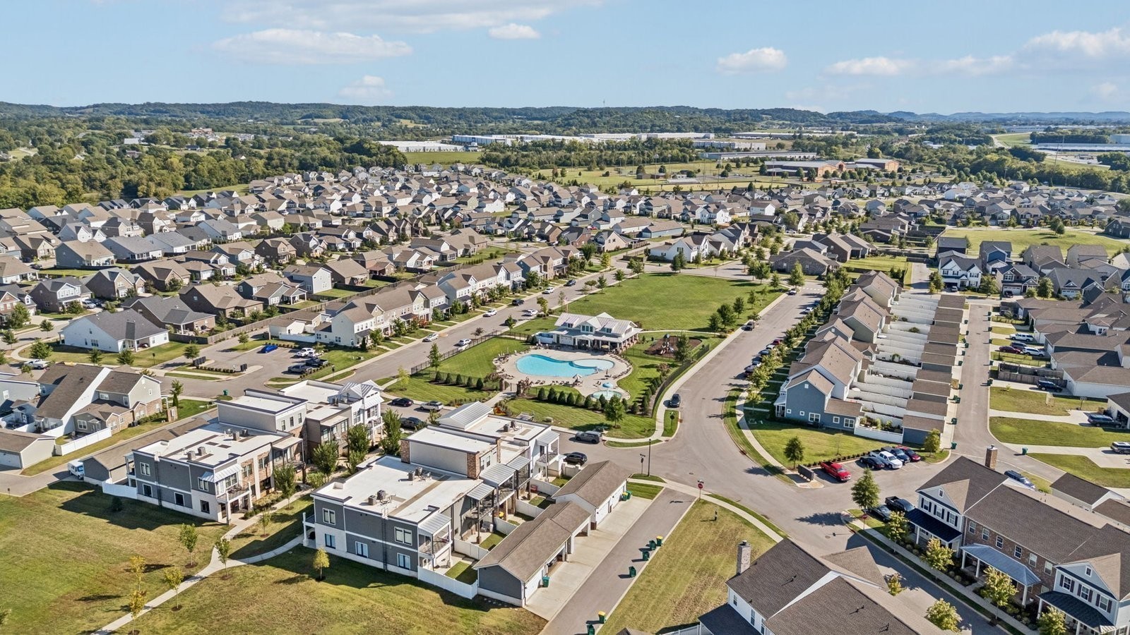 299 Harvest Point Boulevard Spring Hill, TN 37174 - Photo 41 of 48 an aerial view of a city with lots of residential buildings