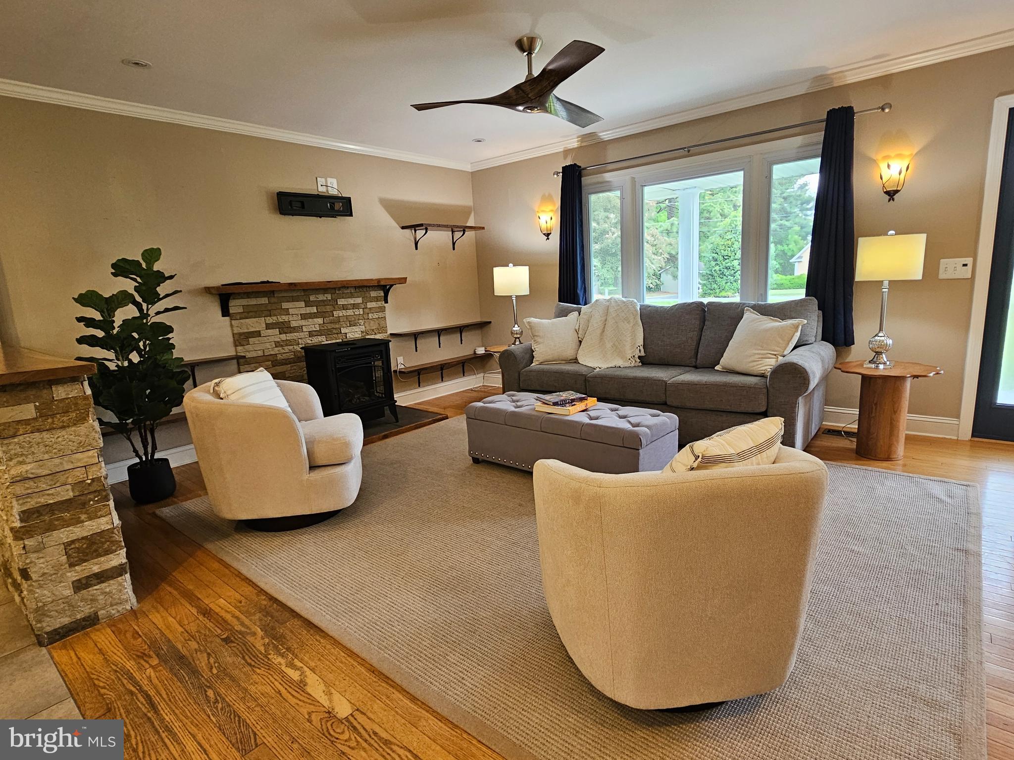 319 Wye Road Queenstown, MD 21658 - Photo 7 of 29 Living room with fireplace