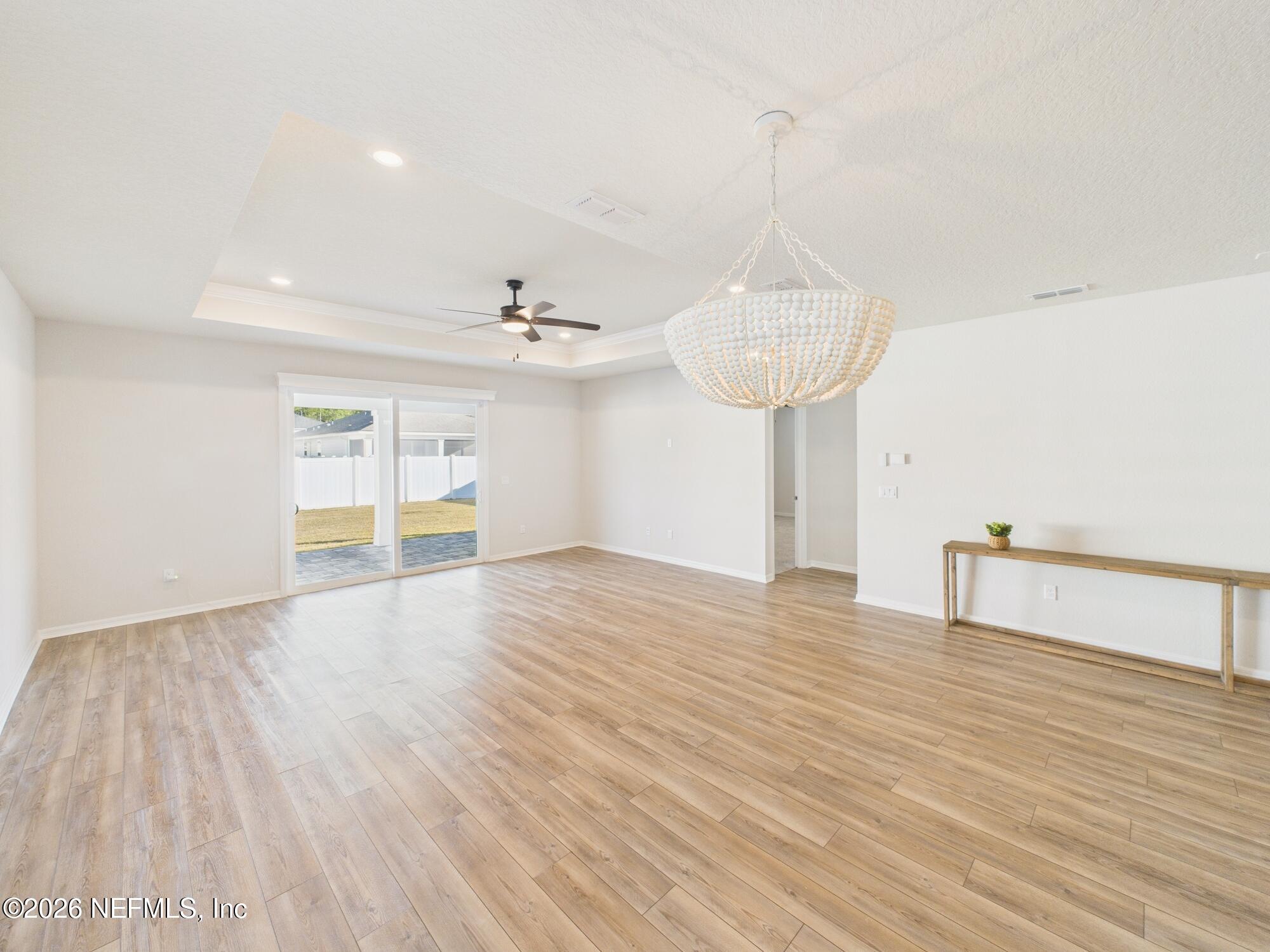 312 Salt Meadow Loop Yulee, FL 32097 - Photo 22 of 48 Family room to Primary Suite