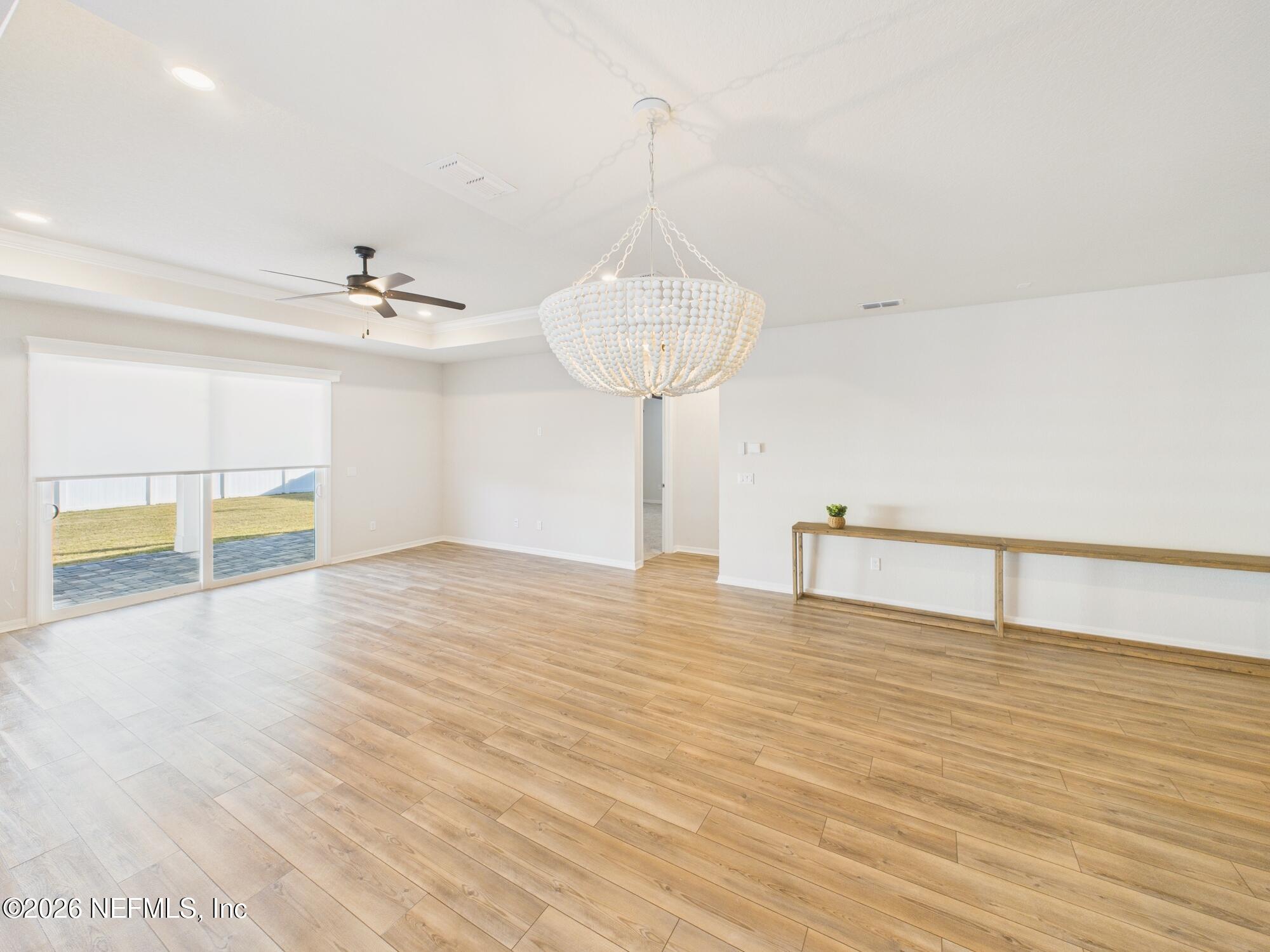 312 Salt Meadow Loop Yulee, FL 32097 - Photo 35 of 48 Family Room to Backyard