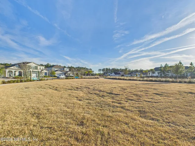 a view of a swimming pool with an ocean view