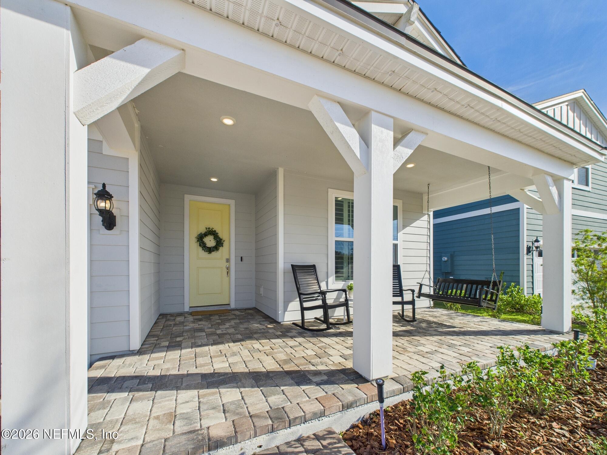 312 Salt Meadow Loop Yulee, FL 32097 - Photo 6 of 48 Covered Front Porch