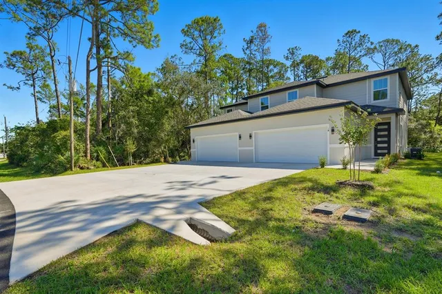 a view of a backyard with a garden