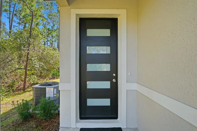 a view of a door and an outdoor space