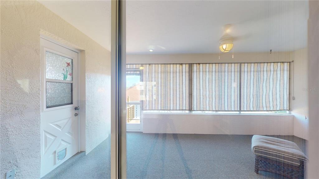 4427 North Bacall Loop Beverly Hills, FL 34465 - Photo 21 of 41 a view of wooden floor and windows in a room