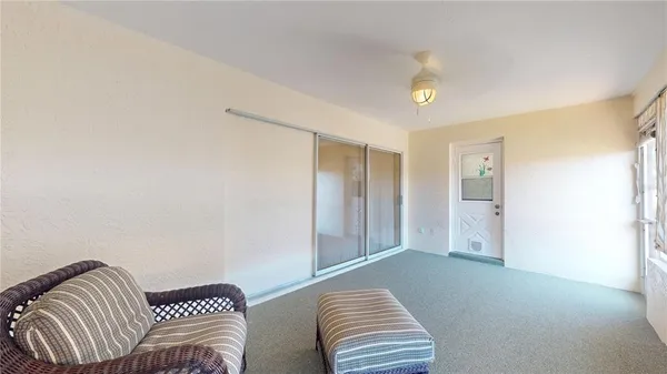 an empty room with staircase