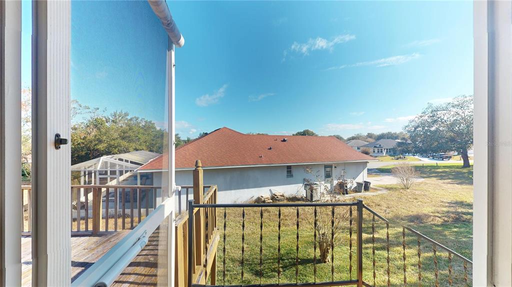 4427 North Bacall Loop Beverly Hills, FL 34465 - Photo 24 of 41 a view of a house with pool and wooden floor