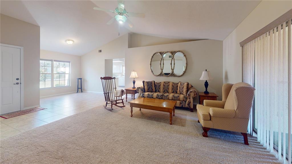 4427 North Bacall Loop Beverly Hills, FL 34465 - Photo 28 of 41 a living room with furniture and a wooden floor
