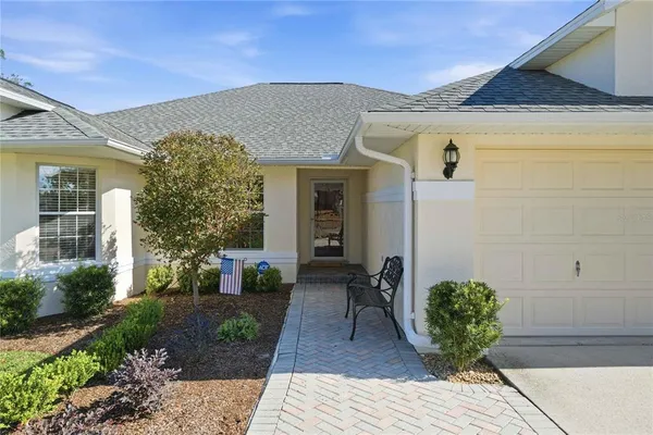 a house view with a garden space