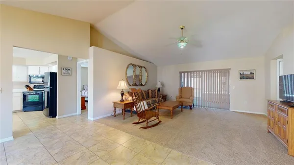 a view of a livingroom with furniture and a livingroom