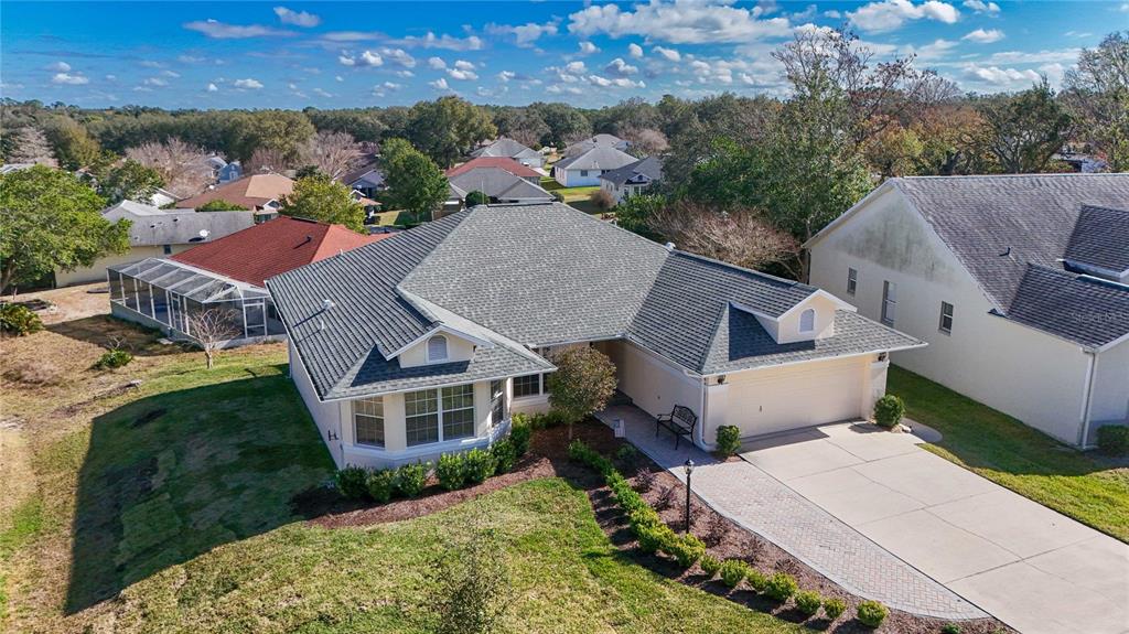 4427 North Bacall Loop Beverly Hills, FL 34465 - Photo 41 of 41 an aerial view of a house with a yard