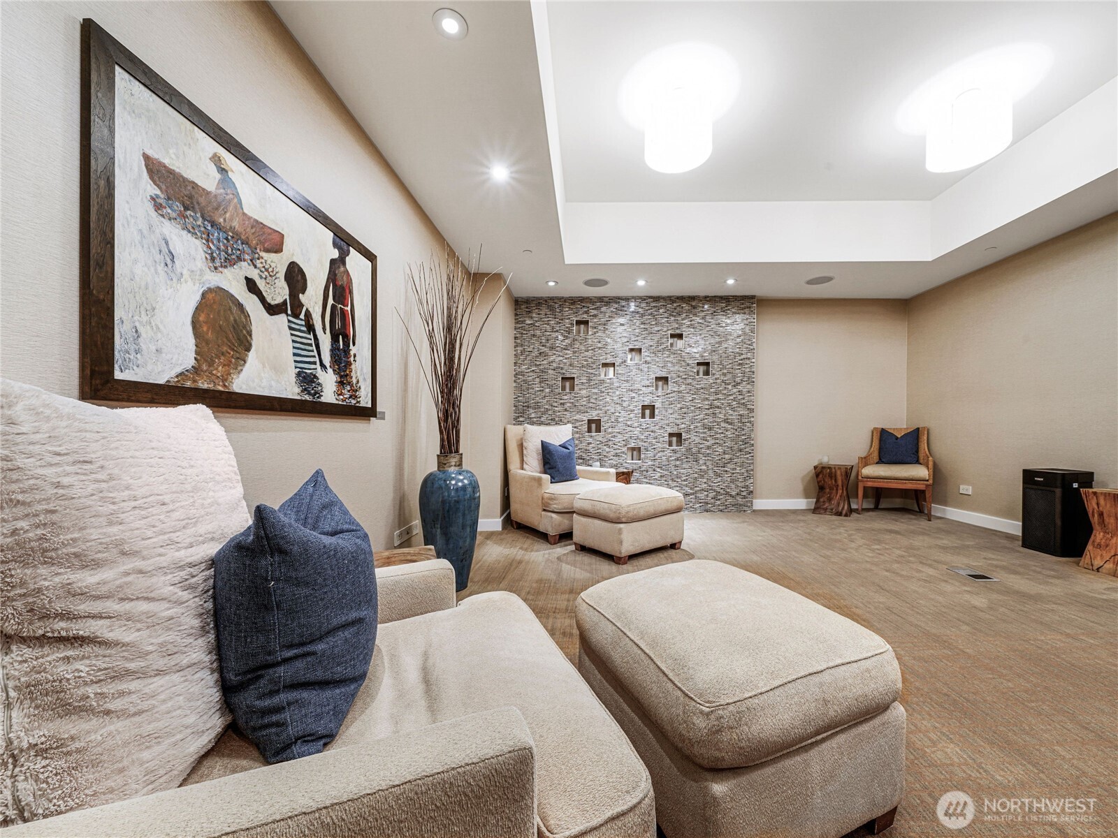 99 Union Street, Unit 1102 Seattle, WA 98101 - Photo 32 of 36 a living room with furniture and wall paintings