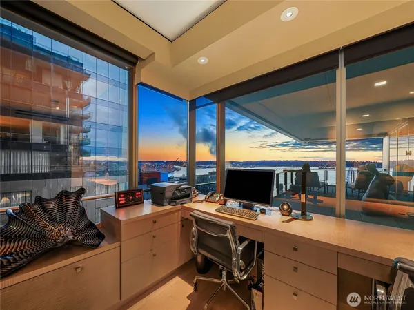 a room with furniture and a large window