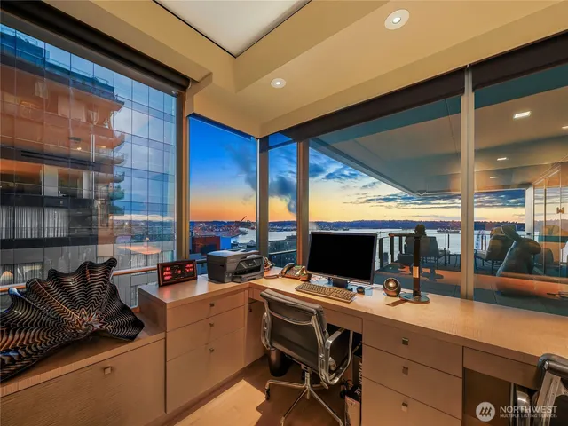 a room with furniture and a large window