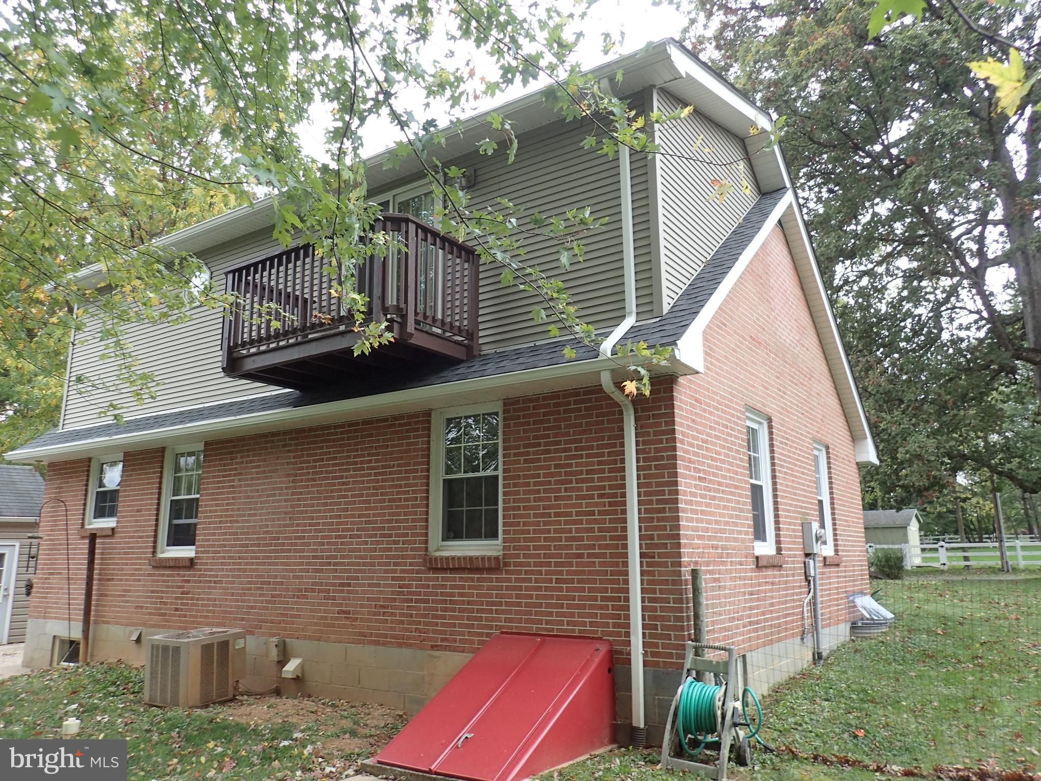 Left Rear Side of House, with Master BR Balcony