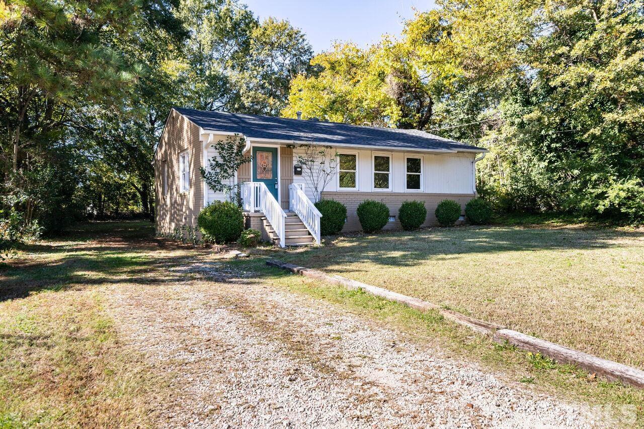 1105 Brighton Road Raleigh, NC 27610 - Photo 21 of 22 a view of a house with backyard and sitting area