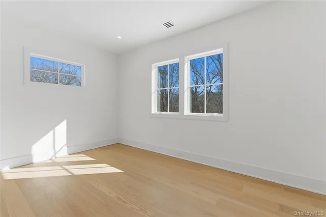 a view of empty room with windows
