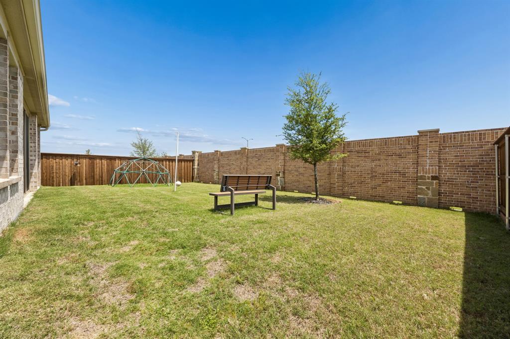 425 Breeds Hl Road Little Elm, TX 75068 - Photo 33 of 38 a house with swimming pool in front of it