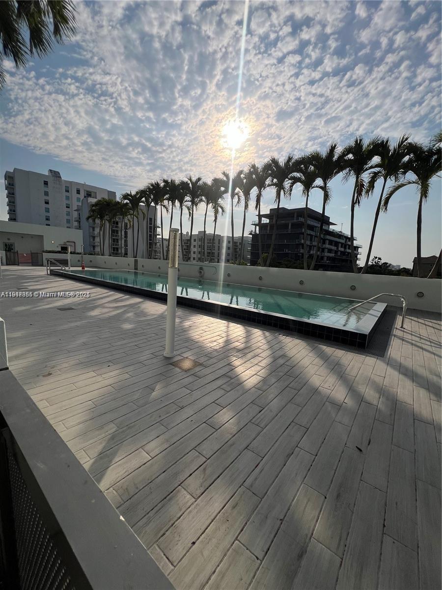 1600 Southwest 1st Avenue, Unit 412 Miami, FL 33129 - Photo 1 of 12 a view of swimming pool with outdoor seating and stairs
