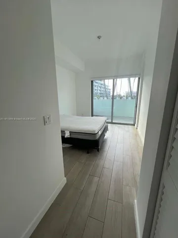 a view of a car park in front of a window