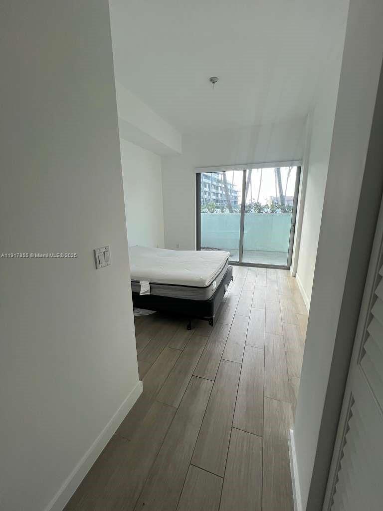 1600 Southwest 1st Avenue, Unit 412 Miami, FL 33129 - Photo 12 of 12 a view of a car park in front of a window