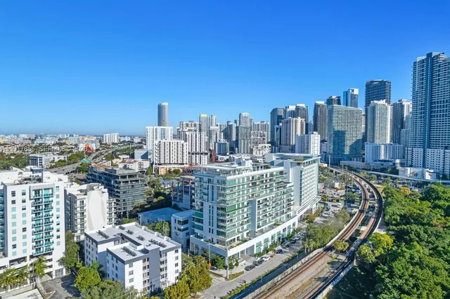 a view of a city with tall buildings