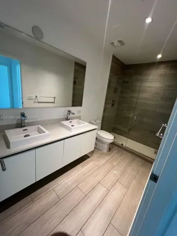 a utility room with washer and dryer