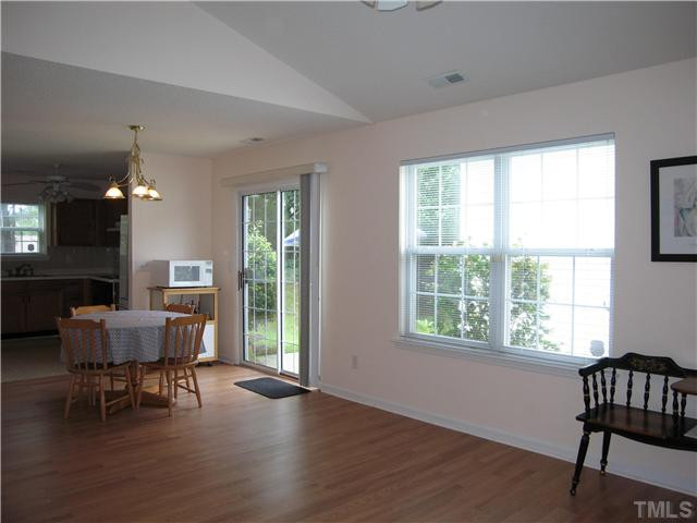 4906 Gable Ridge Drive Durham, NC 27713 - Photo 24 of 24 Open Floor Plan combines LR and Dining. Move In Ready w/ New Laminate and Carpet just installed. Den/Family/Great Room