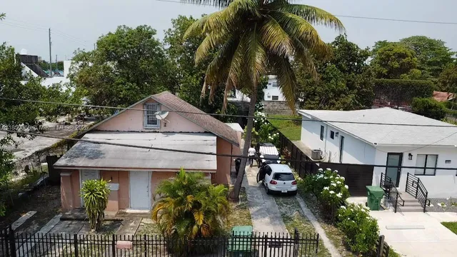 a house view with a garden space