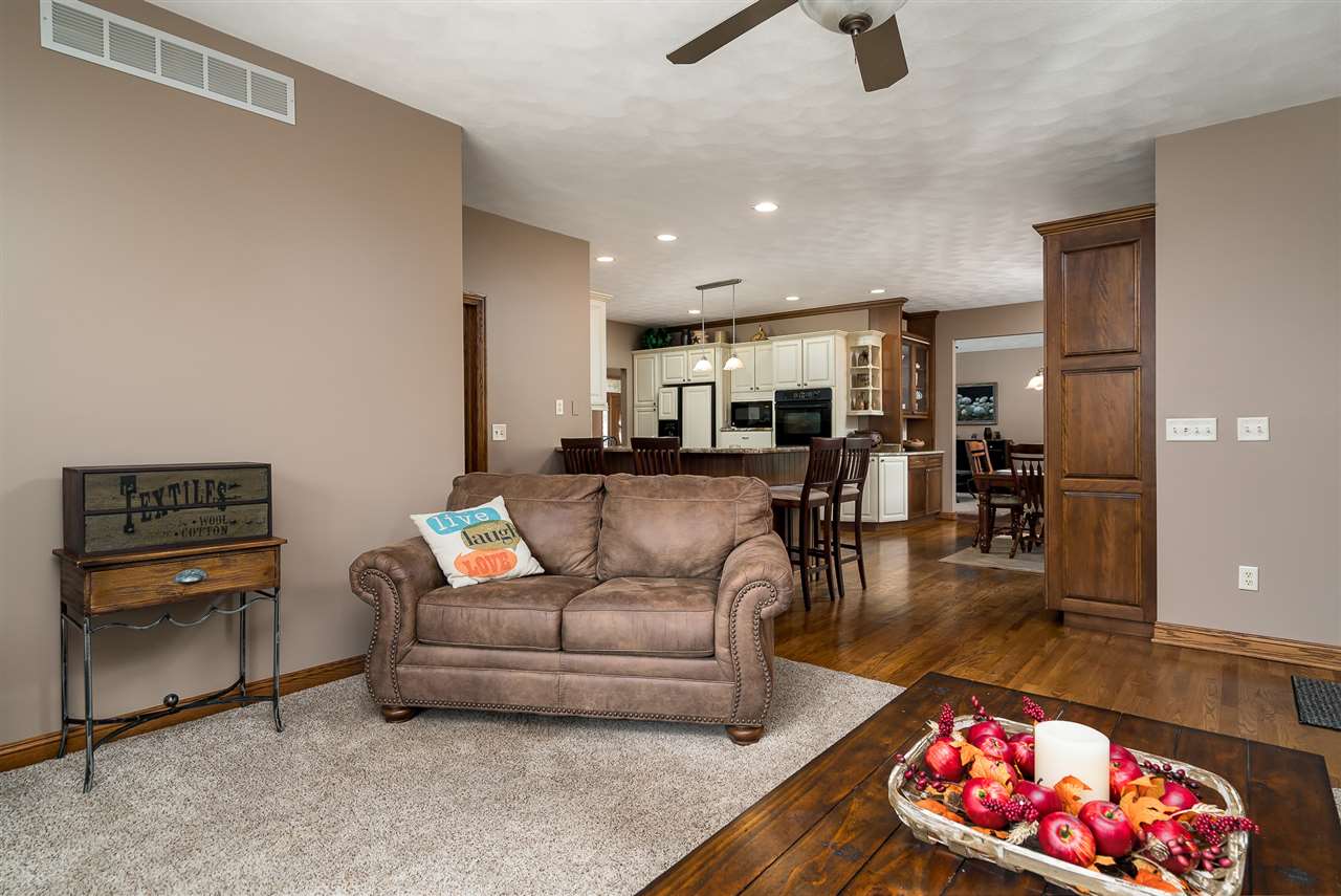 80 North Creek Road Roscoe, IL 61073 - Photo 14 of 25 a living room with furniture and kitchen view