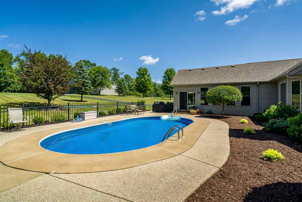 80 North Creek Road Roscoe, IL 61073 - Photo 20 of 25 a view of swimming pool with lounge chair