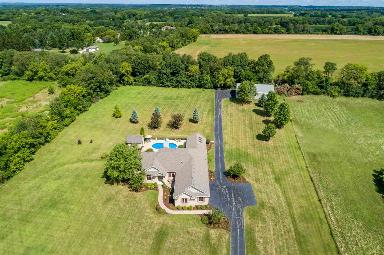 80 North Creek Road Roscoe, IL 61073 - Photo 25 of 25 an aerial view of a residential houses with outdoor space and lake view