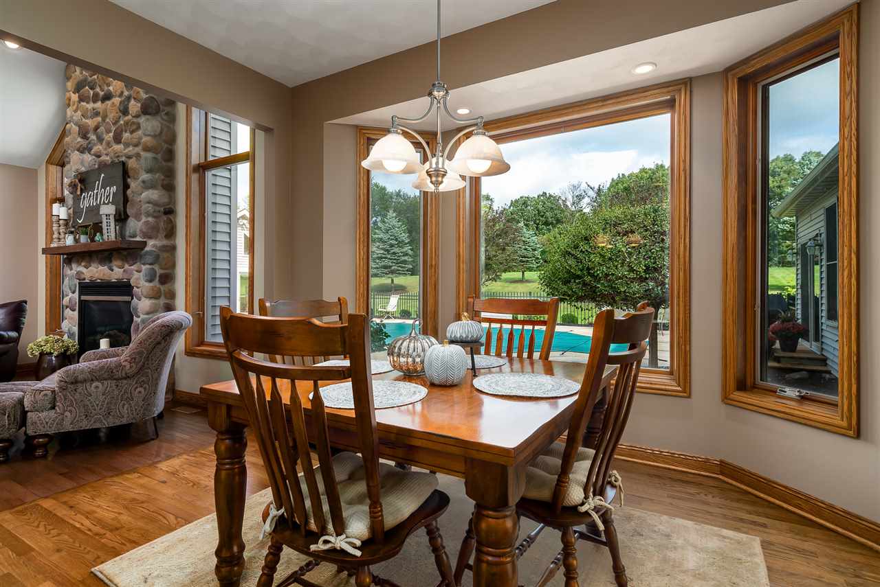 80 North Creek Road Roscoe, IL 61073 - Photo 9 of 25 a view of a dining room with furniture window and outside view