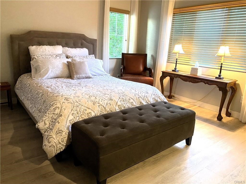 23 Bedstraw Loop Ladera Ranch, CA 92694 - Photo 16 of 37 a bed sitting in a bedroom next to a window
