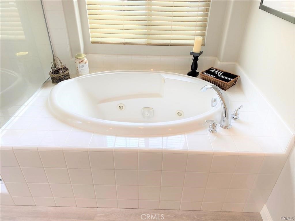 23 Bedstraw Loop Ladera Ranch, CA 92694 - Photo 19 of 37 a bathroom with a bathtub