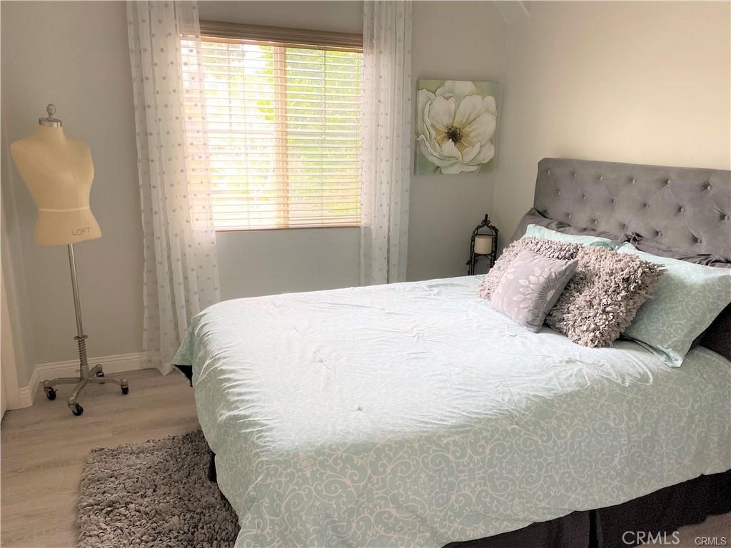 23 Bedstraw Loop Ladera Ranch, CA 92694 - Photo 21 of 37 a bedroom with a bed and a window