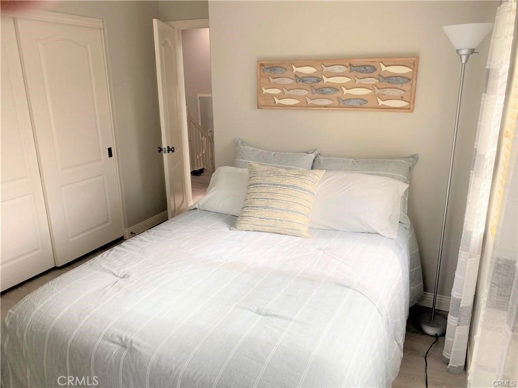 23 Bedstraw Loop Ladera Ranch, CA 92694 - Photo 24 of 37 a bedroom with a bed and a window
