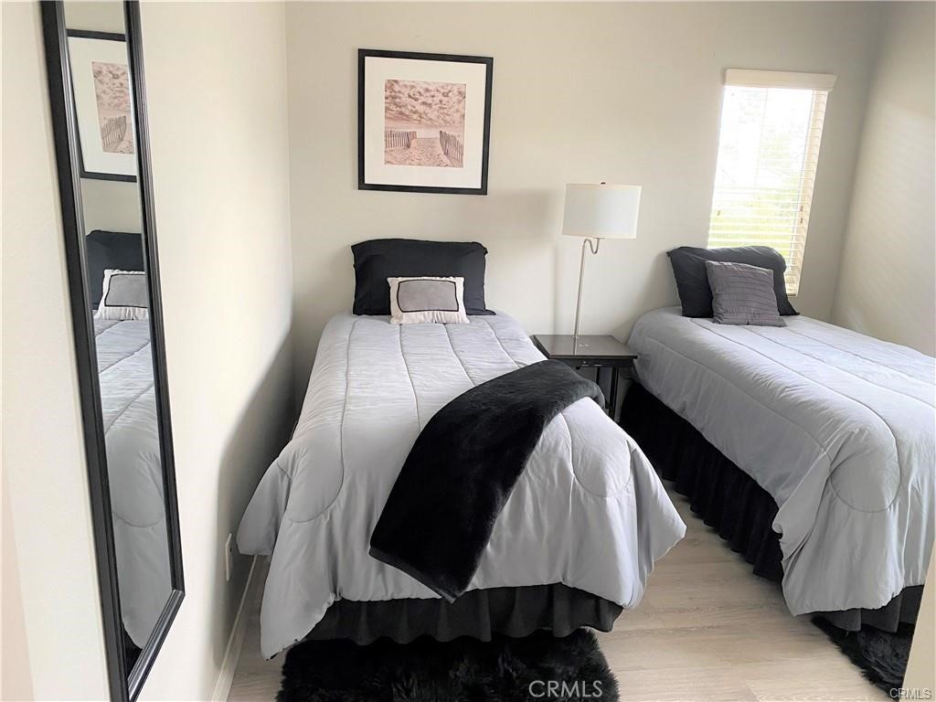 23 Bedstraw Loop Ladera Ranch, CA 92694 - Photo 26 of 37 a bedroom with bed and a window