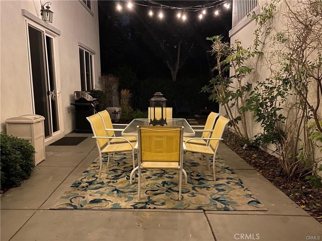 23 Bedstraw Loop Ladera Ranch, CA 92694 - Photo 37 of 37 a view of a chairs and table in backyard