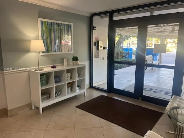 a view of a cabinet and a living room