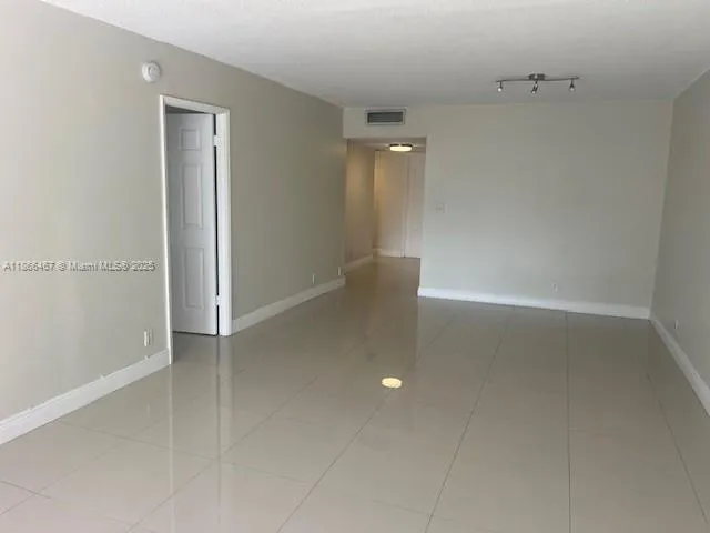 an empty room with a natural light